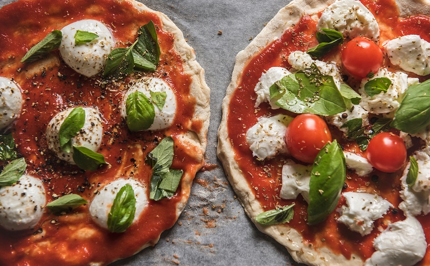 2 pizzas medianas + 4 bebidas (caña o tinto de verano) por SOLO 15 €